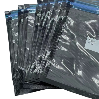 La tirette en plastique de nourriture de ménage met en sac les poches réutilisables de vide de soudure à chaud