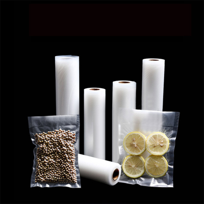 Les sachets en plastique en nylon de pe ont gravé en relief des rouleaux de vide pour le stockage de nourriture de poches de joint sous vide