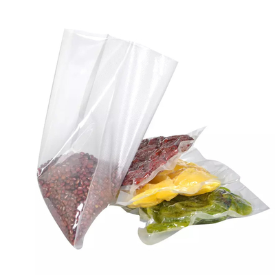 Le sac imprimé fait sur commande d'emballage de vide de PE de PA a gravé les sacs en refief en plastique de stockage de joint de nourriture